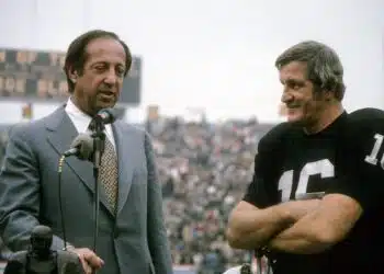 OAKLAND, CA - CIRCA 1970: Quarterback/Kicker george Blanda #16 of the Oakland Raiders, for being voted American Football player of the year is being presented with the " rel="nofollow"Bert Bell" award by commissioner Pete Rozelle circa 1970 at the Oakland, Coliseum in Oakland, California. Blanda played for the Raiders from 1967-75.