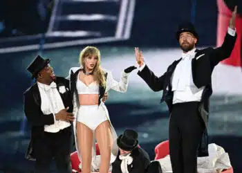 LONDON, ENGLAND - JUNE 23: (EDITORIAL USE ONLY. NO BOOK COVERS) EXCLUSIVE ACCESS. Taylor Swift is joined on stage by Travis Kelce (R), during "Taylor Swift | The Eras Tour" at Wembley Stadium on June 23, 2024 in London, England.